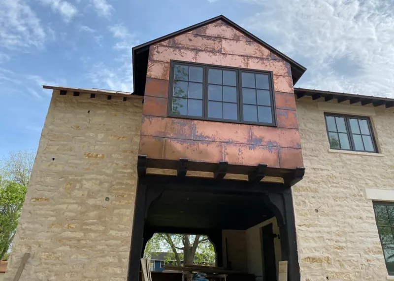 Copper metal panel facade on a stone building for Metal Roof Coating in Cupertino